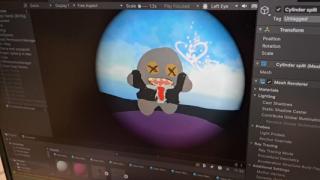 Game character on computer screen.